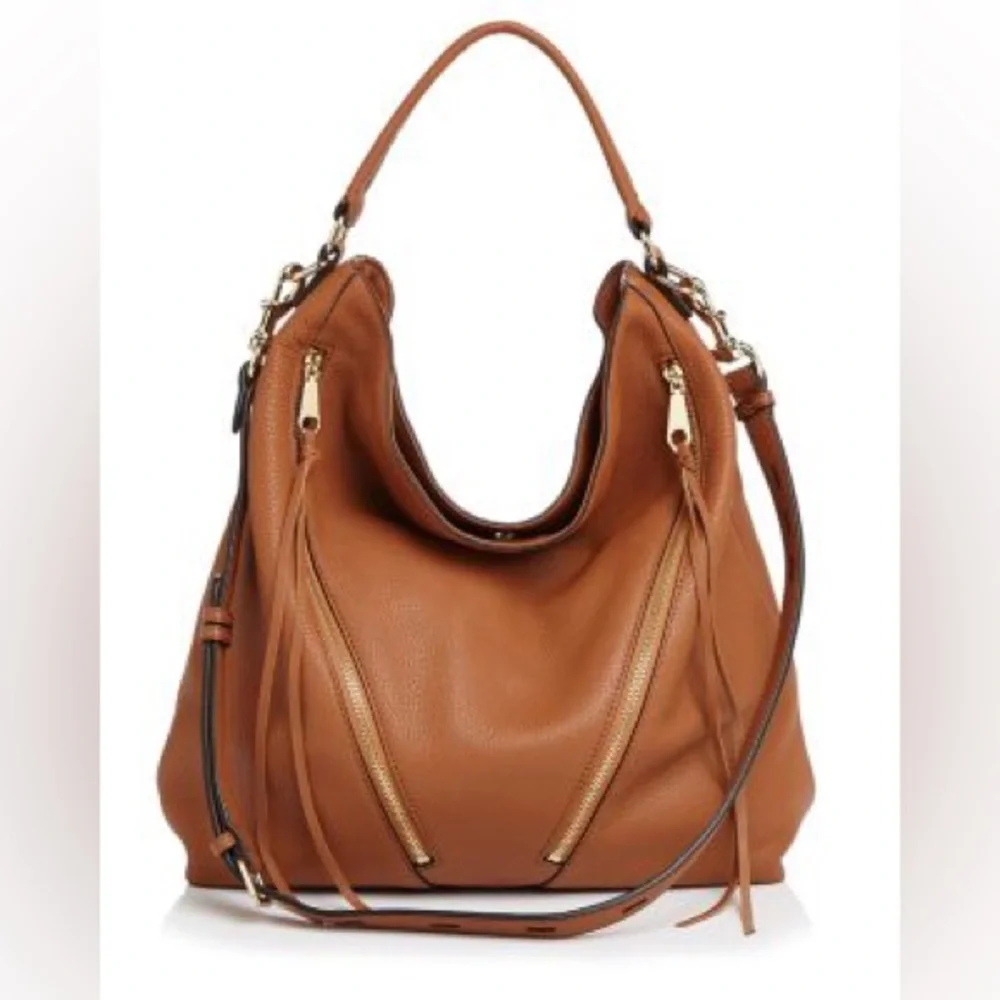Rebecca Minkoff Moto hobo bag featuring prominent vertical zippers on the front.